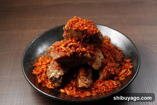Spiced Meat Dish on Black Plate