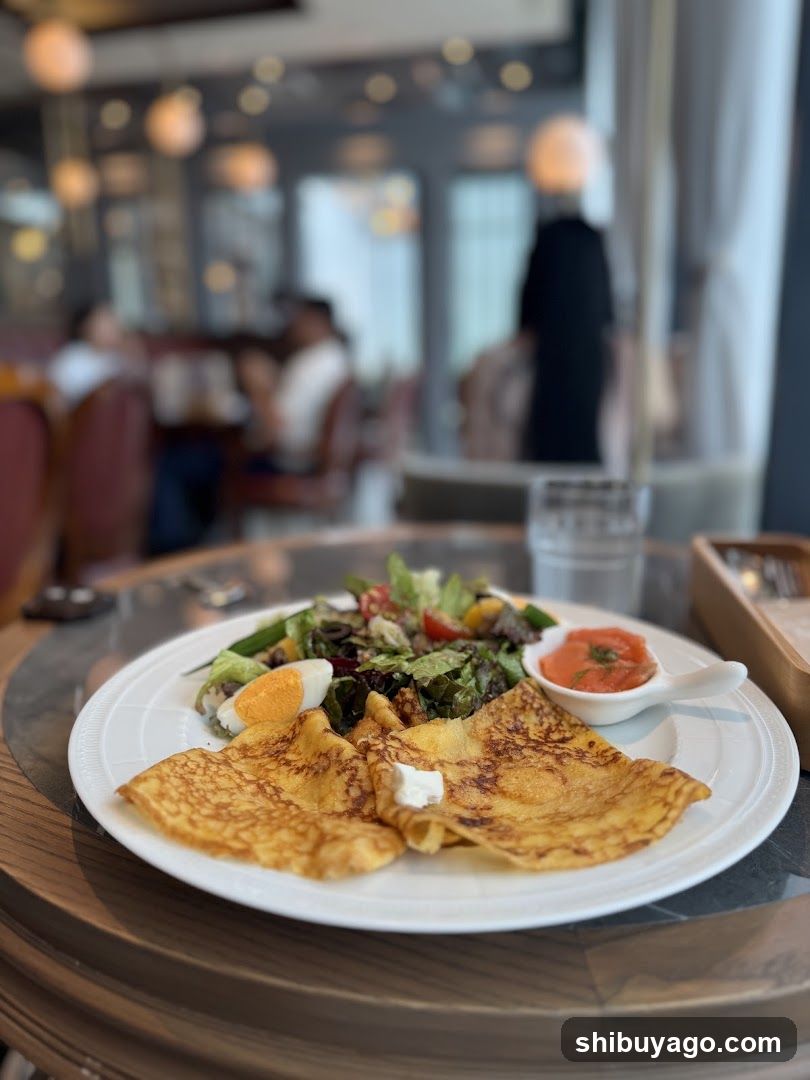 Breakfast Plate with Crepes and Salad