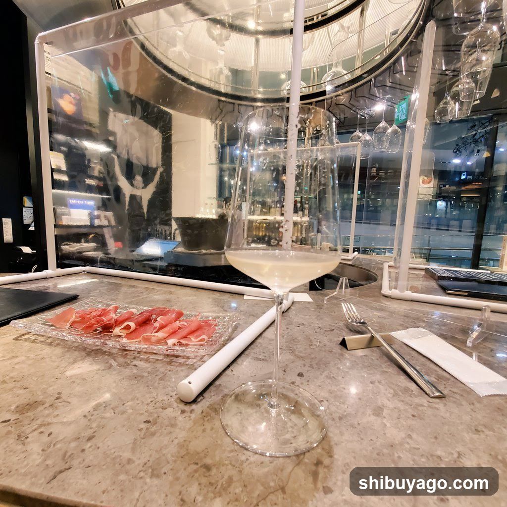Dining Table with Prosciutto and Wine
