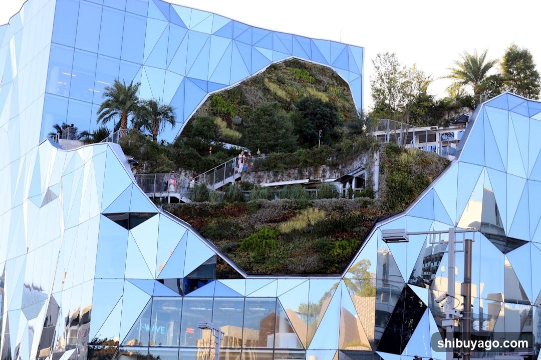 Geometric Glass Building with Green Roof