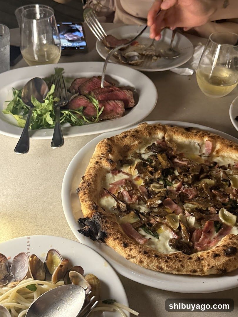 Dining Table with Pizza and Steak
