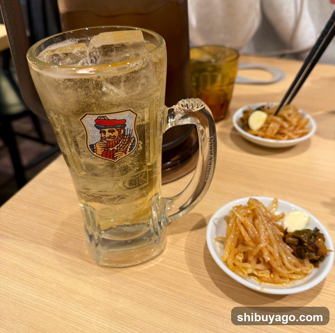 Beer and Side Dishes at a Restaurant Table