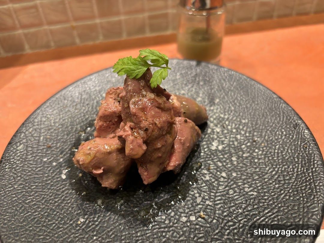 Sliced Meat Dish with Herb Garnish