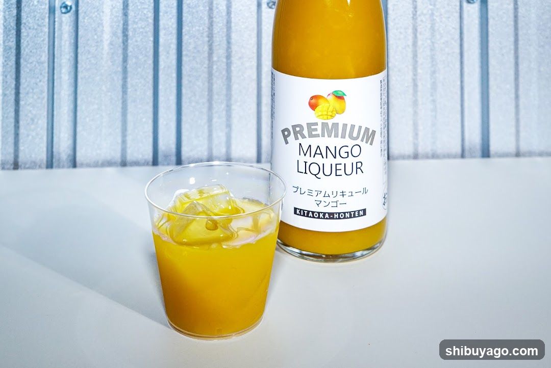 Premium Mango Liqueur Bottle and Glass