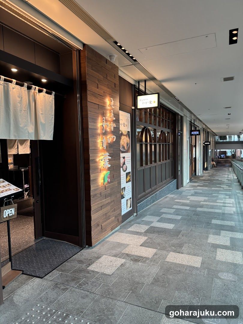 Storefront with illuminated signage and menu board