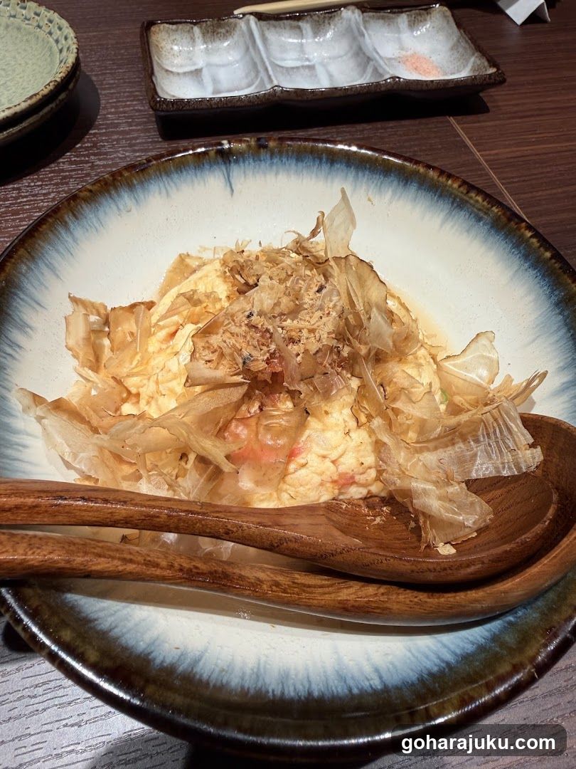 Japanese Omelette Dish with Wood Chopsticks and Serving Utensils