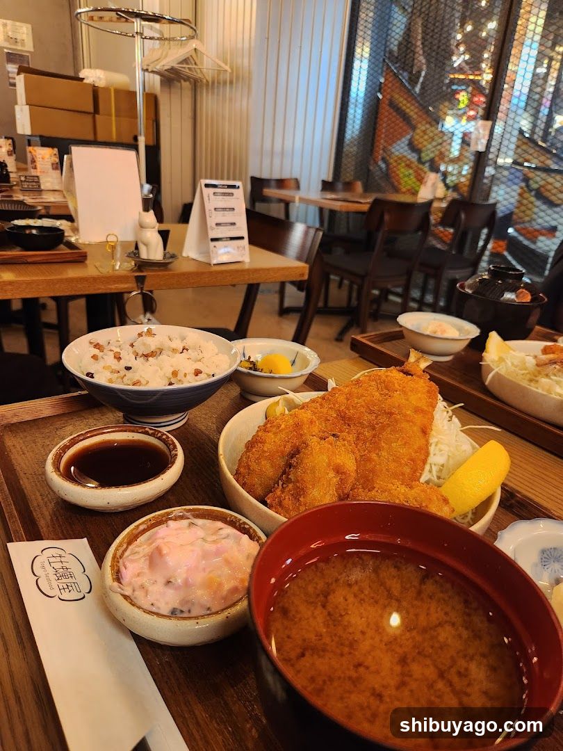 Japanese Restaurant Interior with Fried Fish and Rice