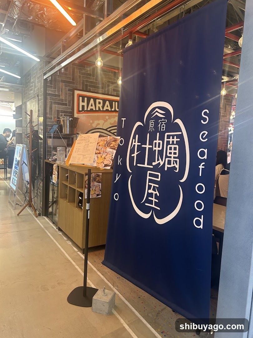 Blue banner with Japanese characters and seafood menu display