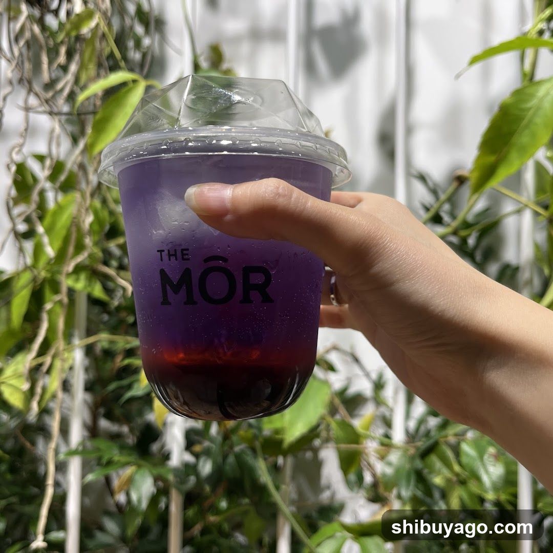 Purple drink in cup with logo