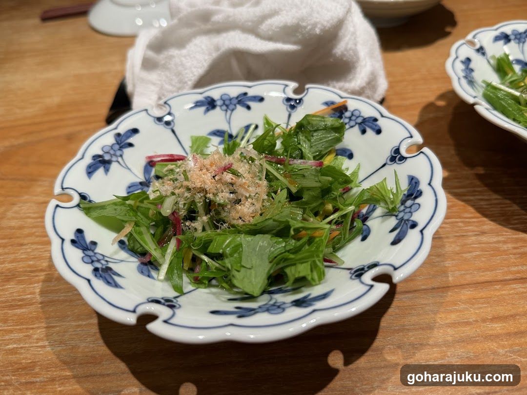 Salad with garnish in decorative bowl