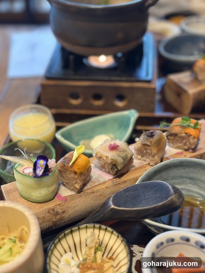 Japanese-style food spread with sushi and hot pot