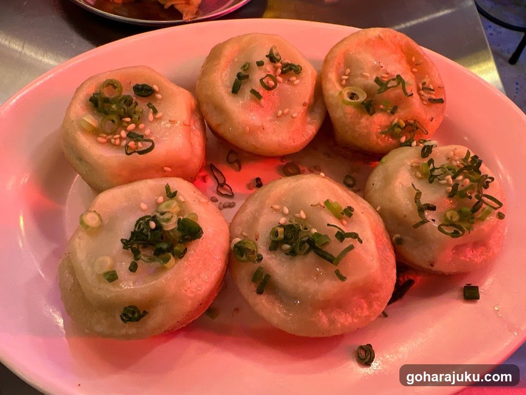 Steamed Dumplings with Scallions and Sesame Seeds