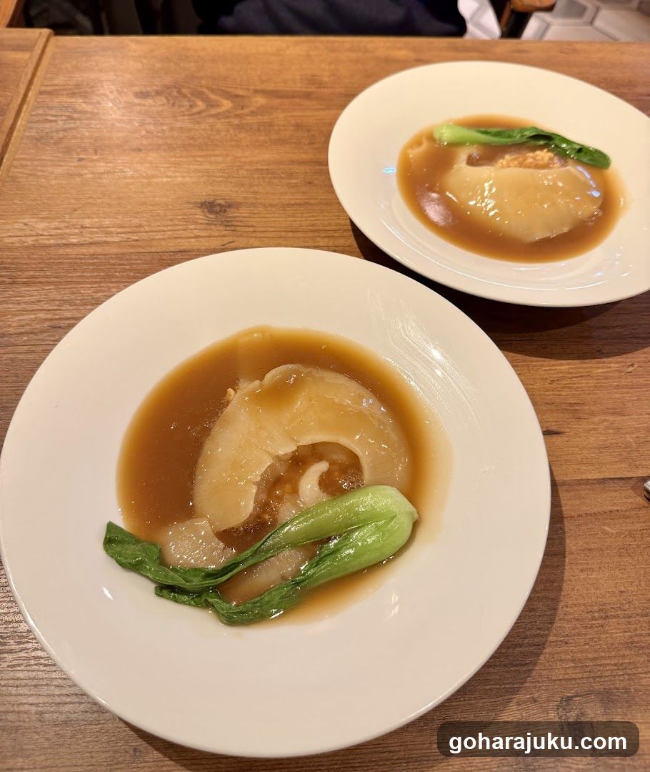 Dish with Broth and Greens