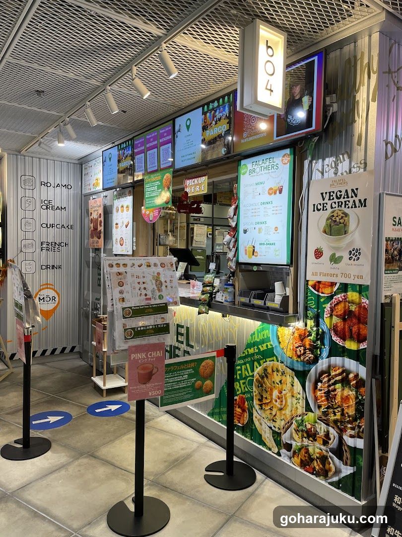 Food stall interior with menus and signage