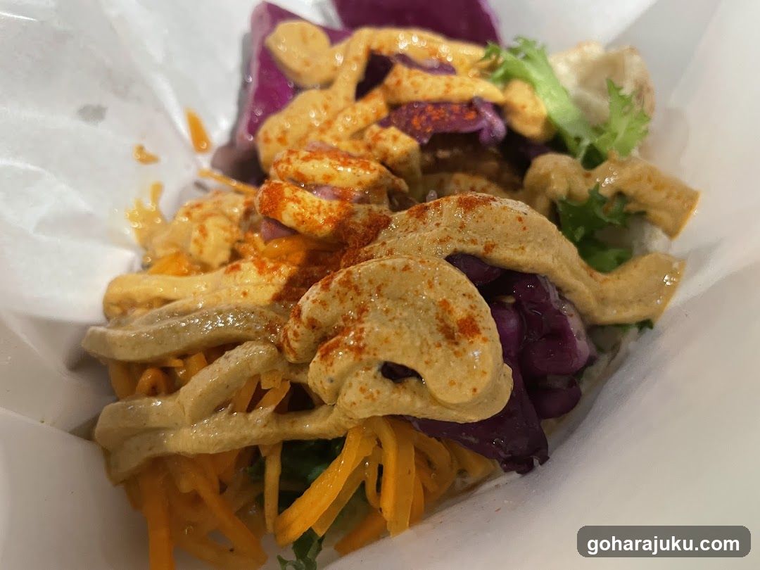 Spicy Tacos with Shredded Cheese and Red Cabbage