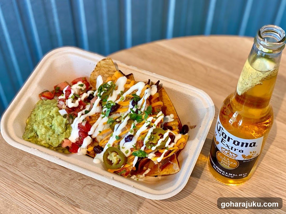 Nachos with Guacamole and Corona Beer
