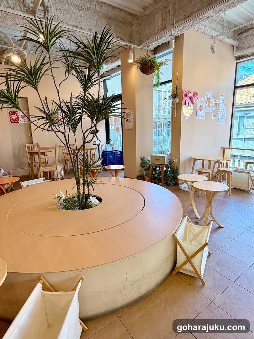 Interior of a cozy cafe with plants and wooden furniture