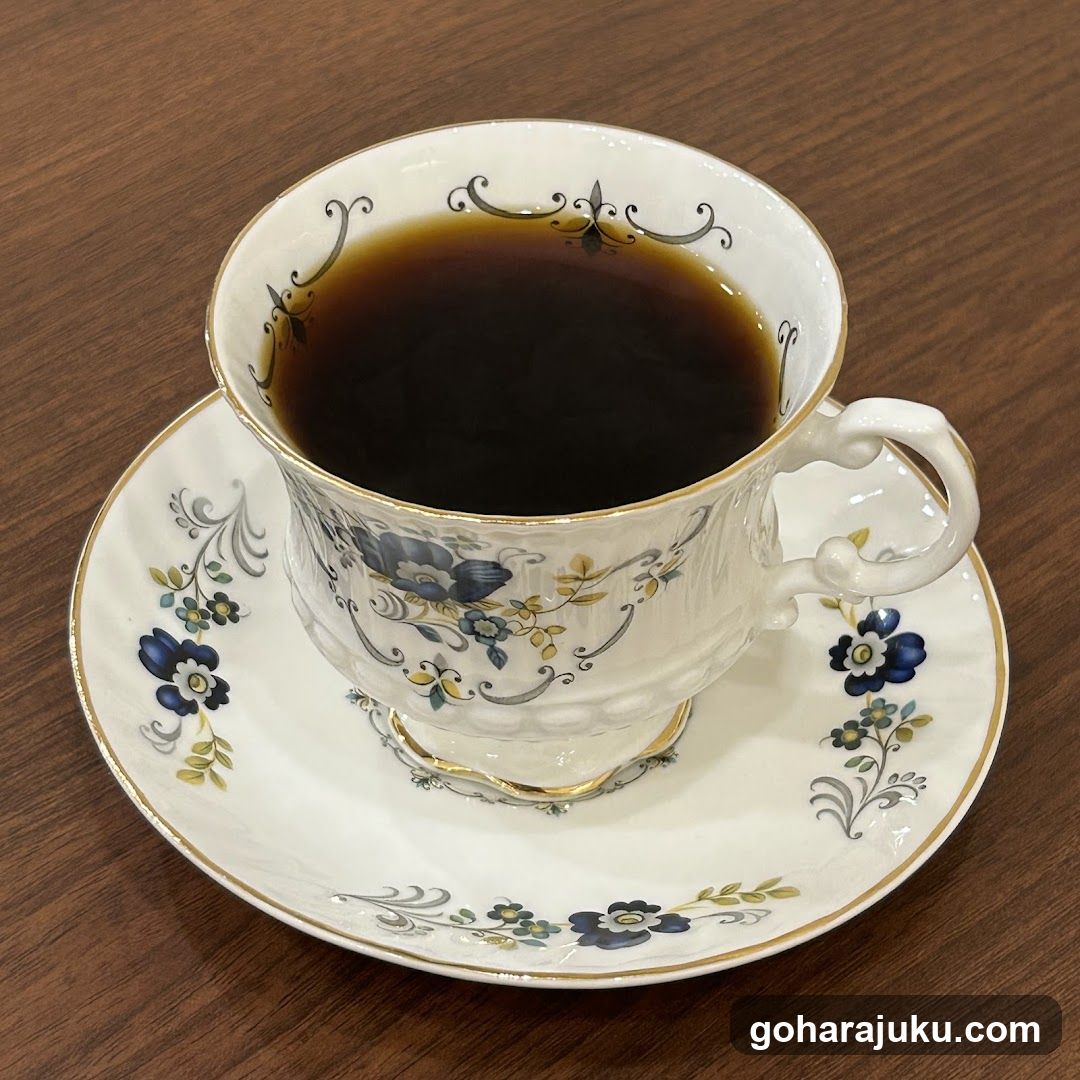 Coffee in ornate cup and saucer