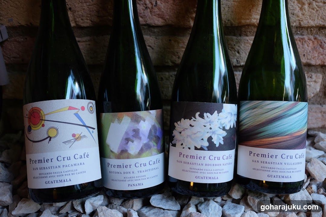 Four bottles of Premier Cru Café wine