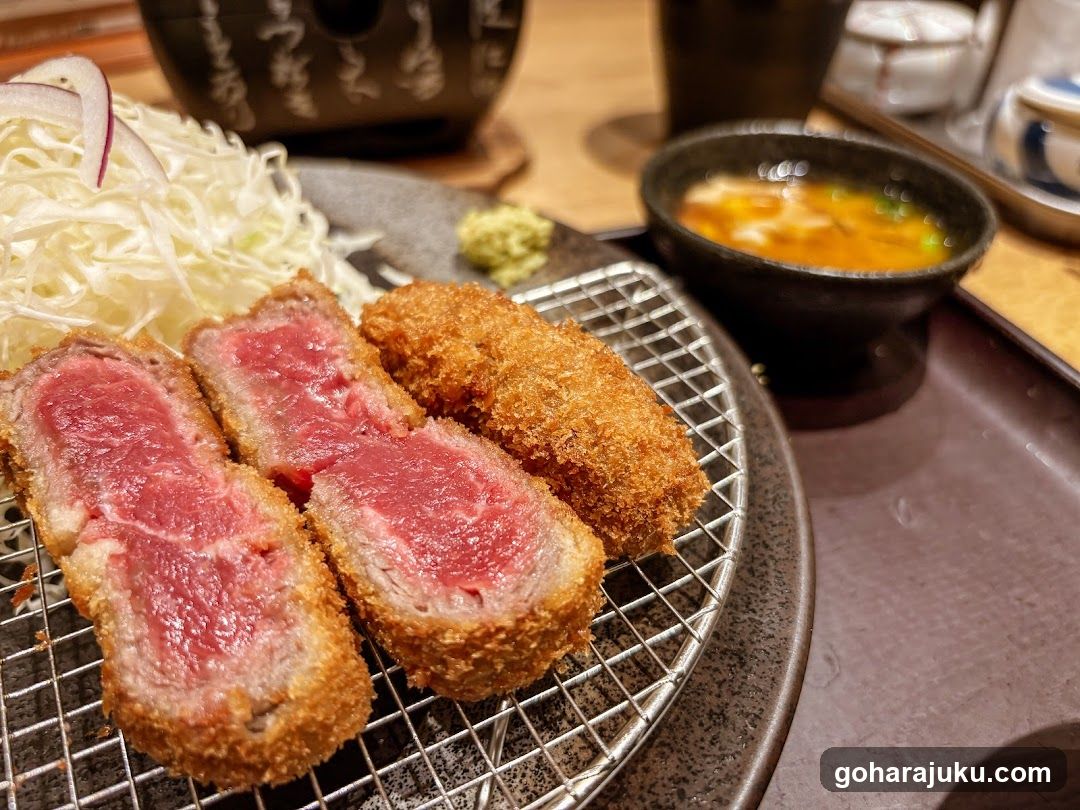 Sliced Steak with Crispy Coating and Side Dishes