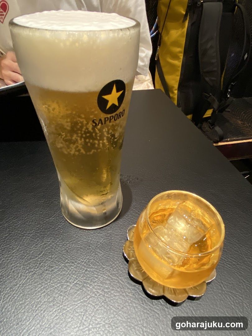 Sapporo Beer and Cocktail on Table