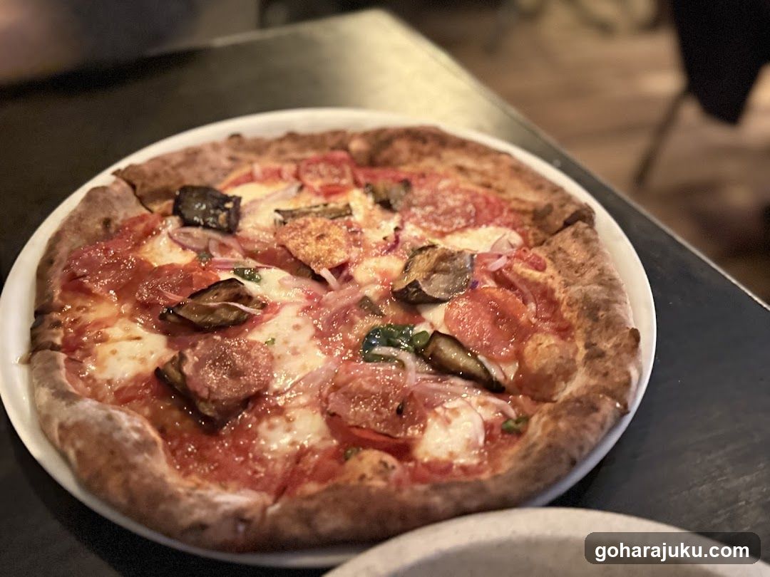 Pizza with toppings on a plate