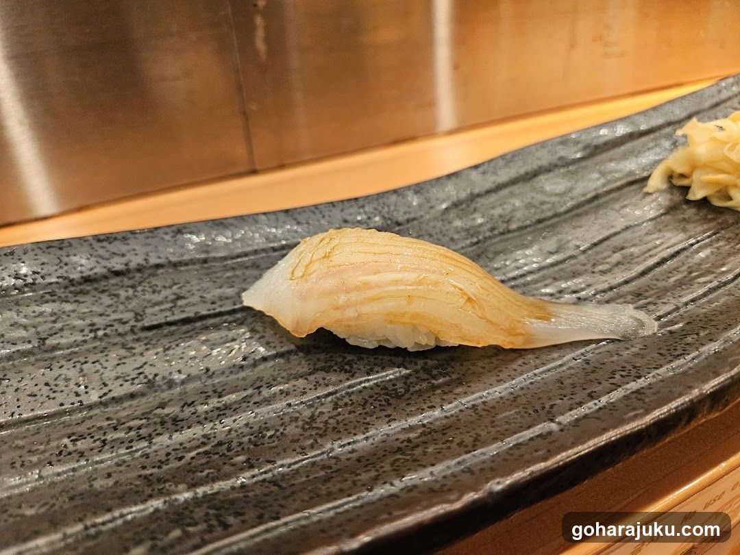 Sushi on a dark plate