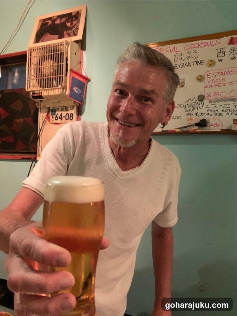 Man holding beer in bar setting