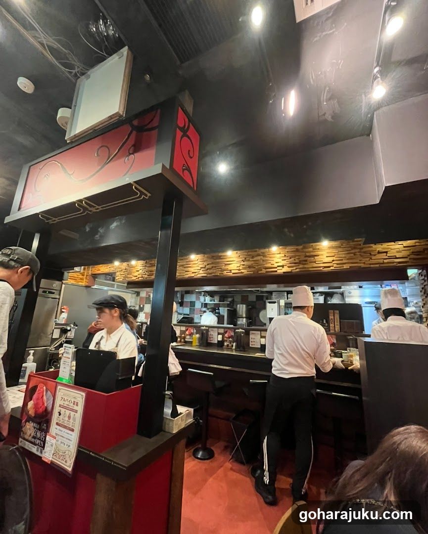 Restaurant Interior with Staff and Kitchen View