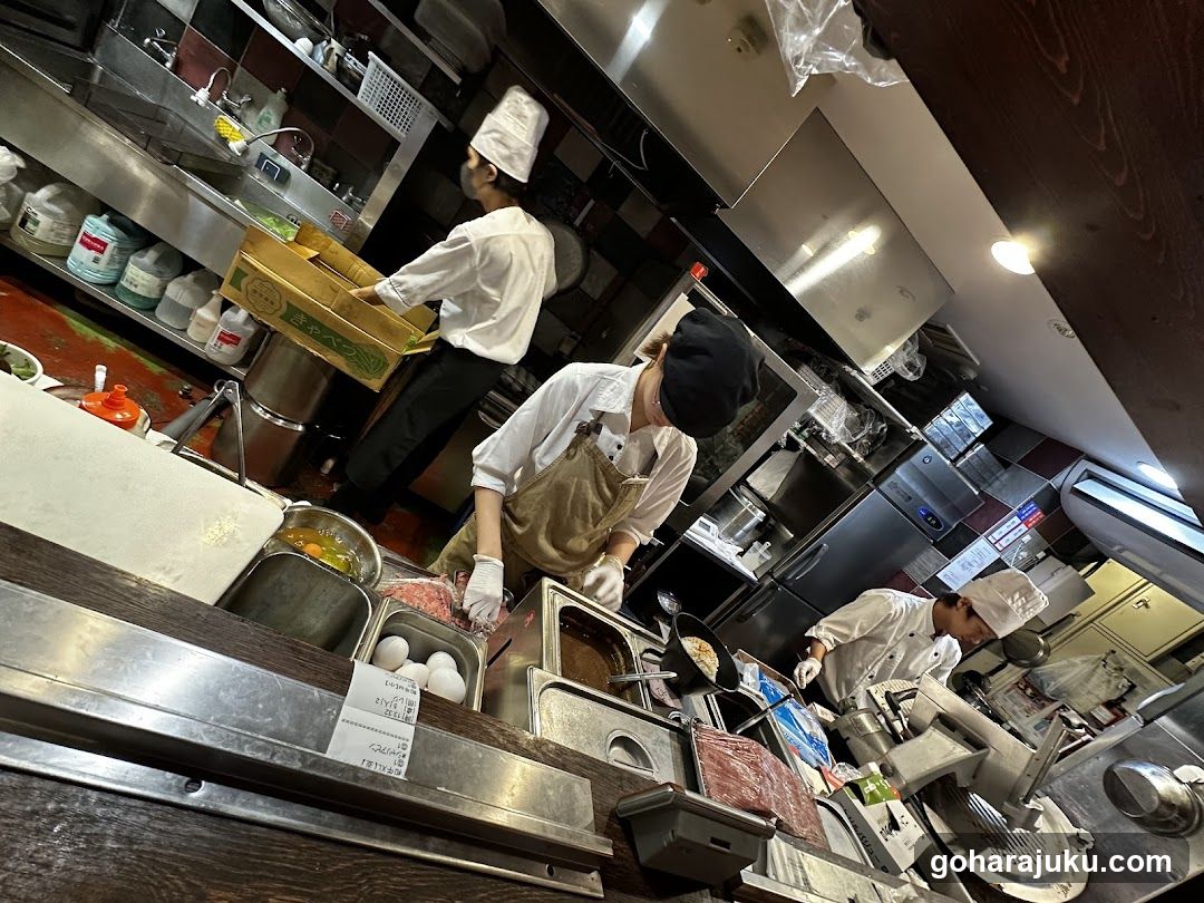 Kitchen Staff Preparing Food