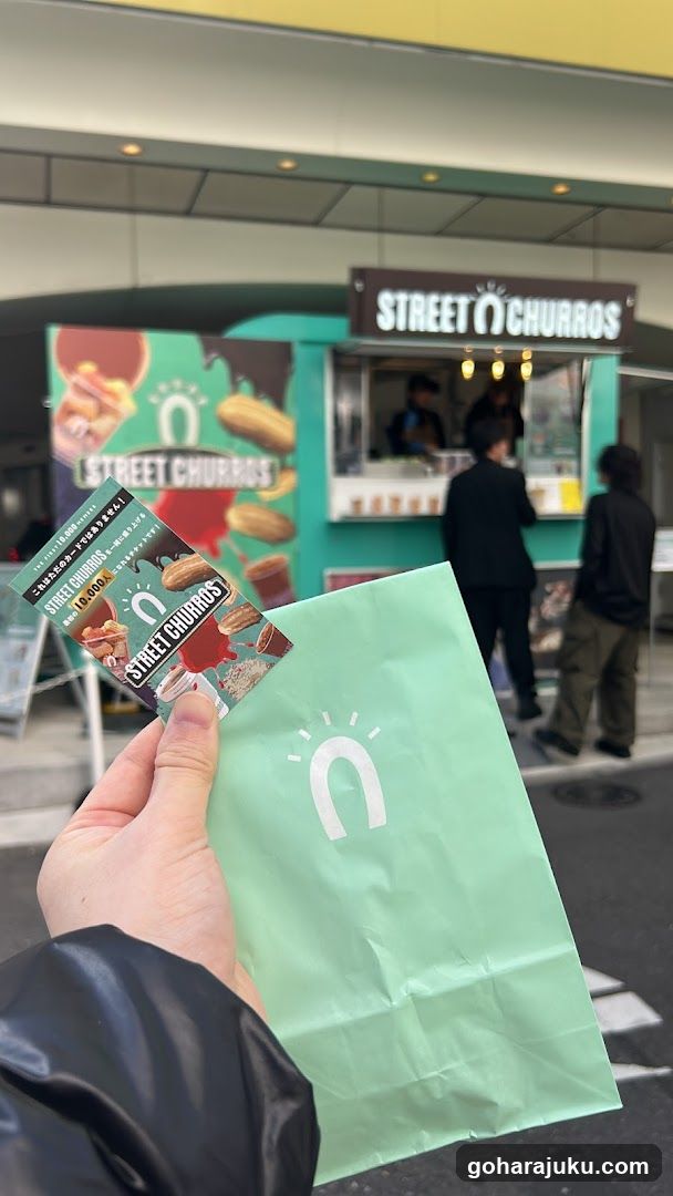 Street Churros Shop Exterior with Menu and Bag