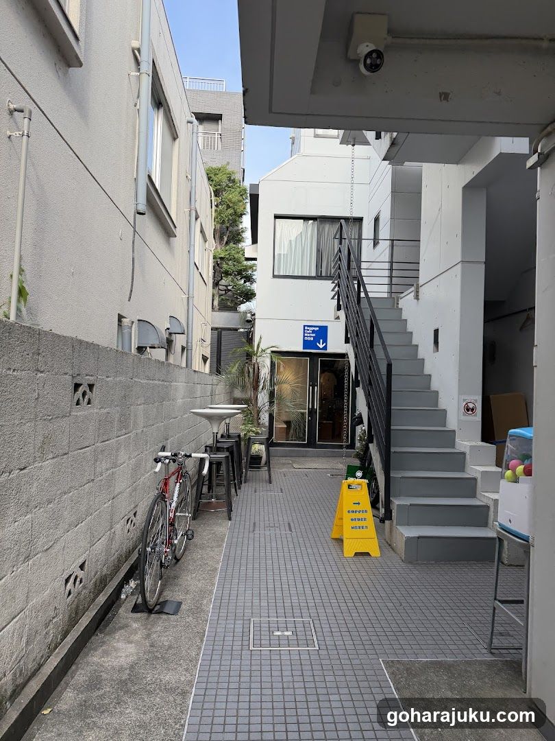 Alleyway Entrance with Stairs and Bicycle