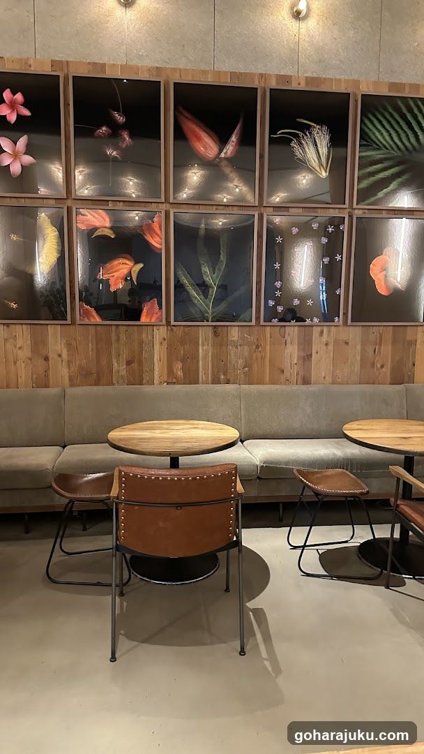 Interior seating area with floral wall art