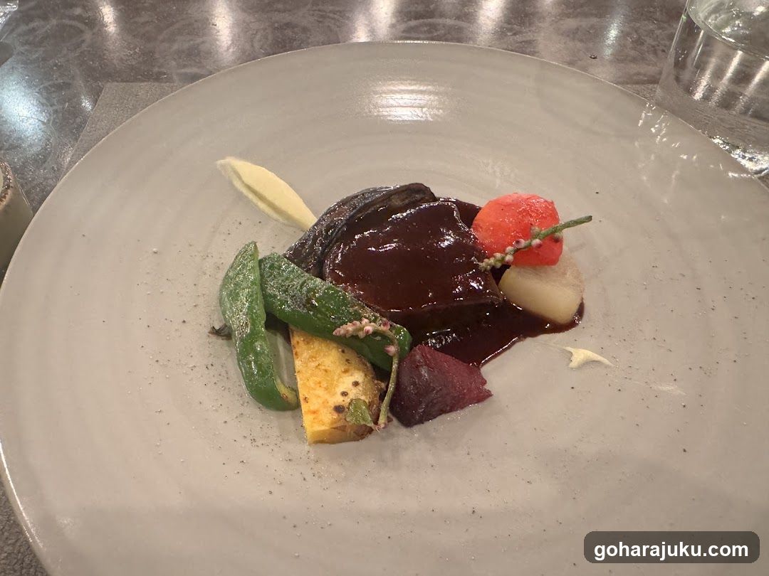 Plated Dish with Sauce and Vegetables