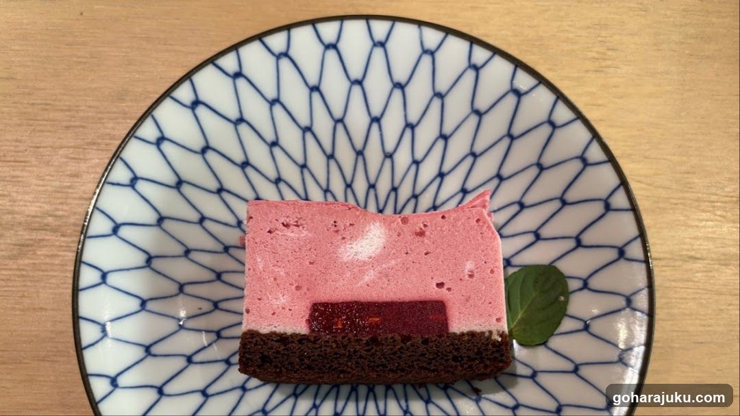 Pink Dessert Slice on Patterned Plate
