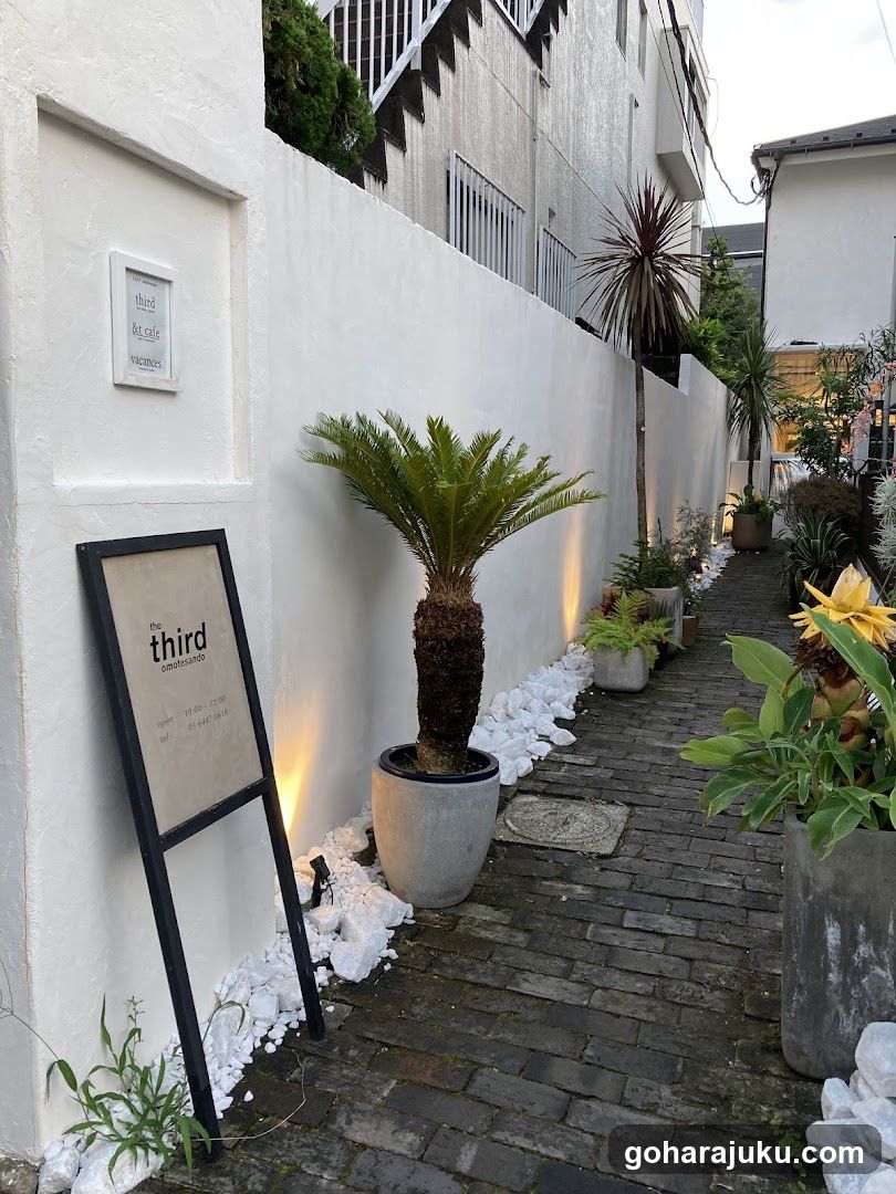 Outdoor Pathway with Plants and Signage