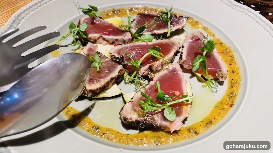 Sliced Seared Fish with Microgreens and Sauce