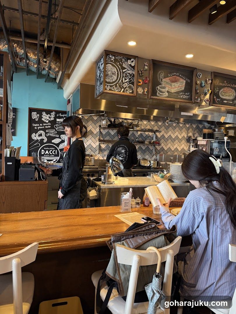 Interior of a cafe with customers and staff
