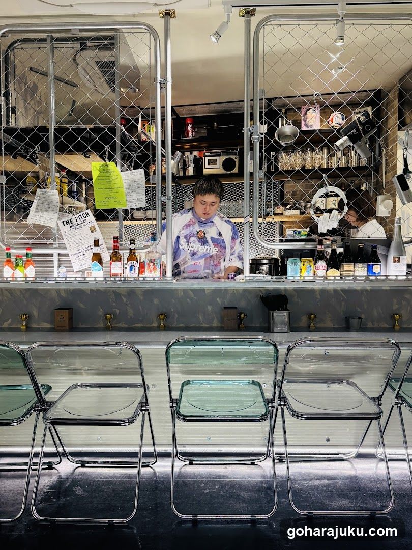 Bar Interior with Staff Behind Counter