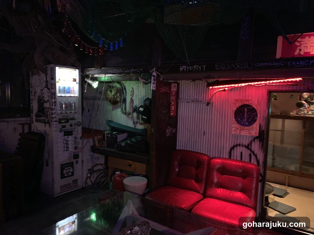 Red Leather Sofa and Vending Machine Interior
