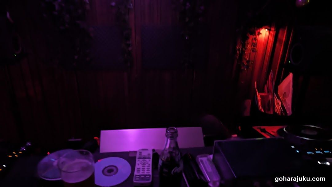 DJ Setup with Remote and Bottle