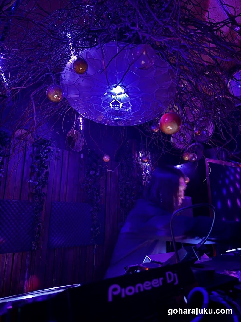 DJ Setup in Purple-Lit Room
