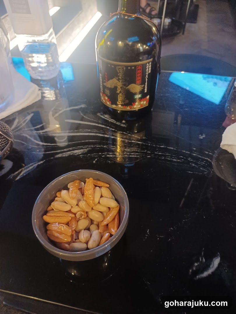 Bottled Drink and Snack Bowl on Table