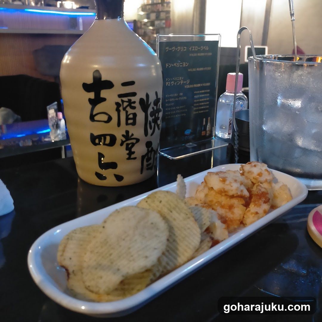 Sake and snacks on a table