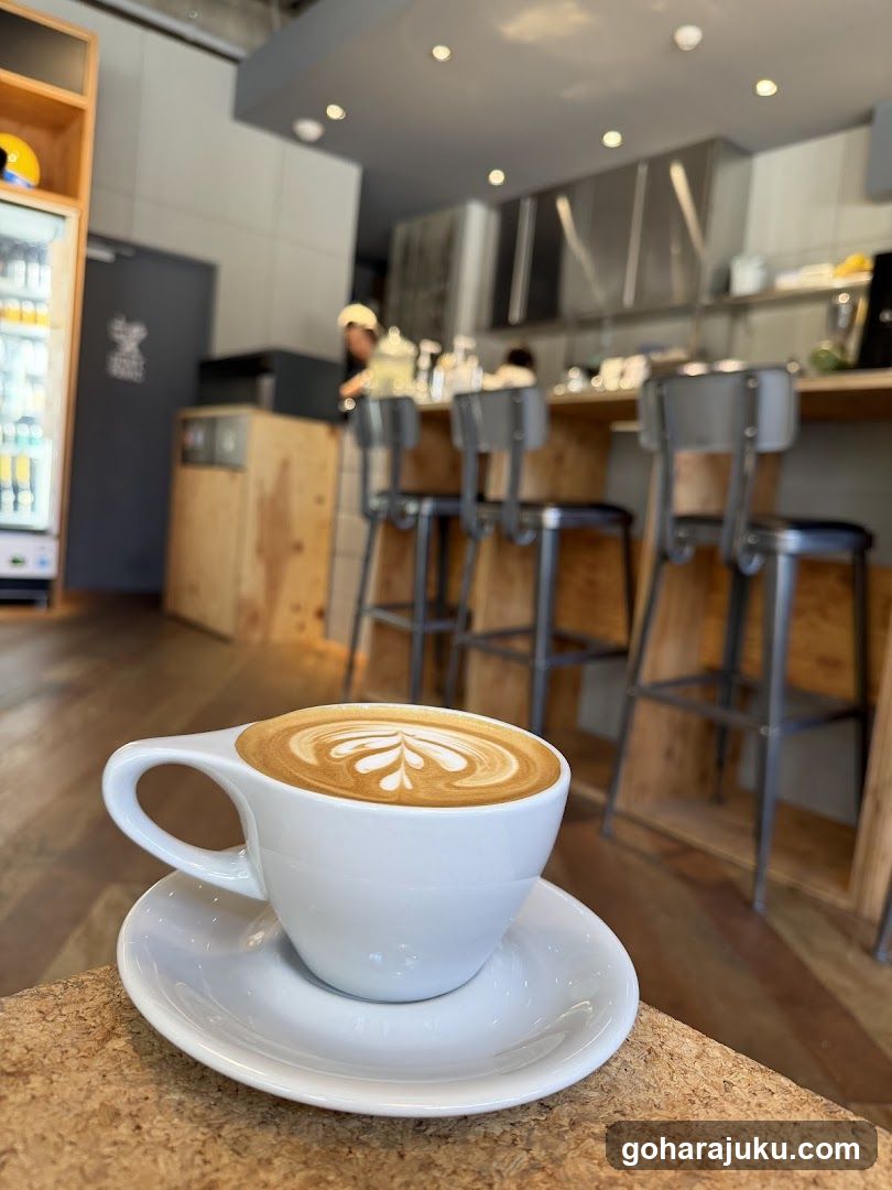 Latte Art Coffee Cup in Modern Cafe Interior