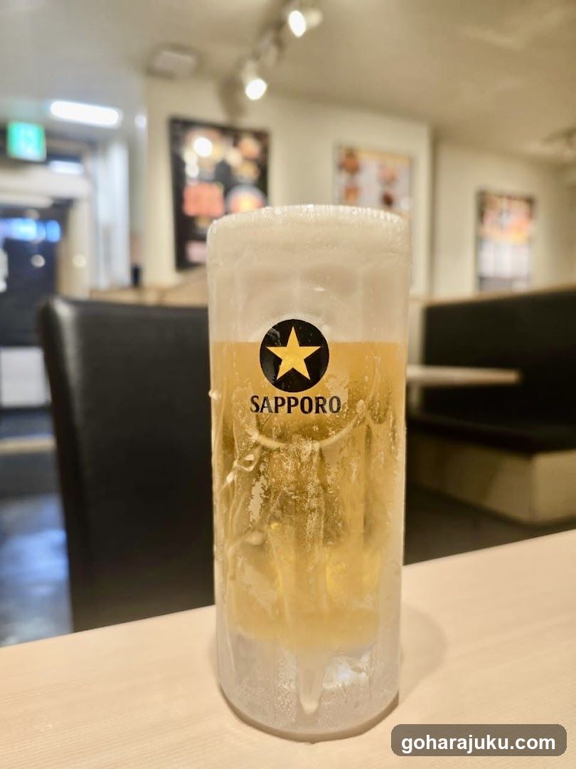 Sapporo Beer Glass in Restaurant Interior