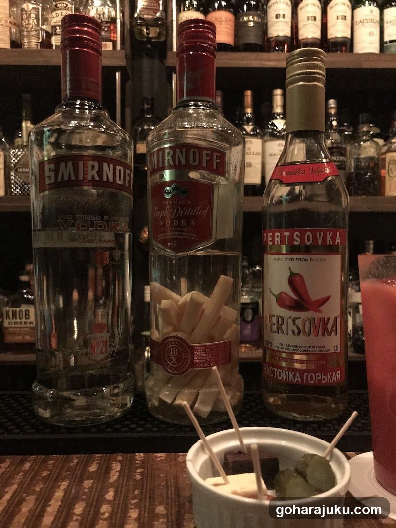 Bottles of Vodka and Spirits on a Bar Counter