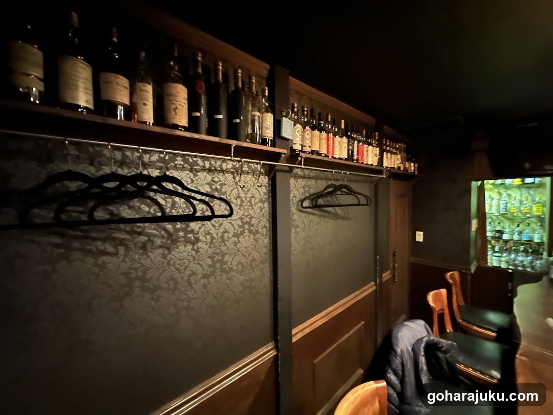 Bar Interior with Bottles and Coat Rack