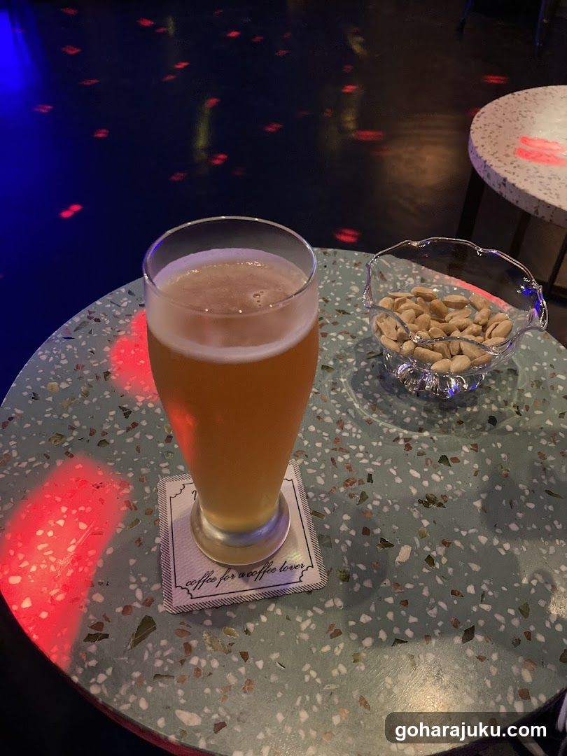 Beer and Nuts on a Table