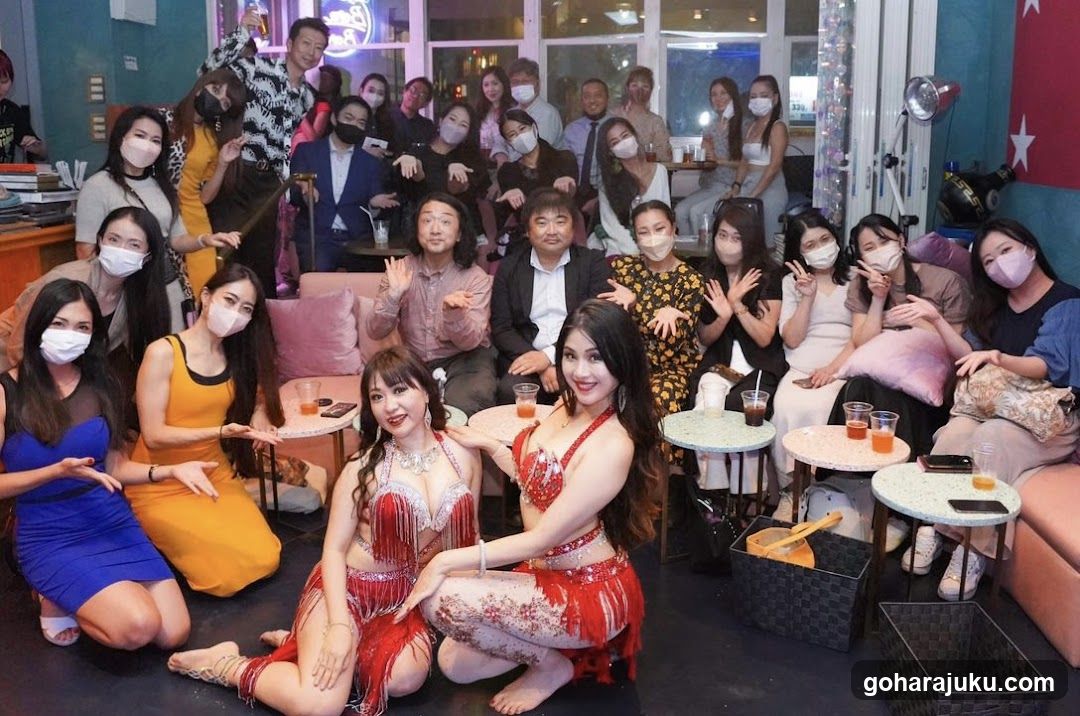 Group photo in a lounge or bar setting
